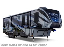 Used 2016 Keystone Fuzion Chrome 414 Triple Slide with 12' Enclosed Garage available in Williamstown, New Jersey