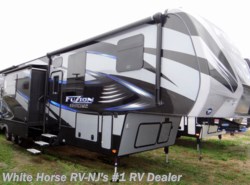 Used 2016 Keystone Fuzion Chrome 414 Triple Slide with 12' Enclosed Garage available in Williamstown, New Jersey