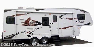 Used 2009 Keystone Cougar 316QBS available in Grand Rapids, Michigan