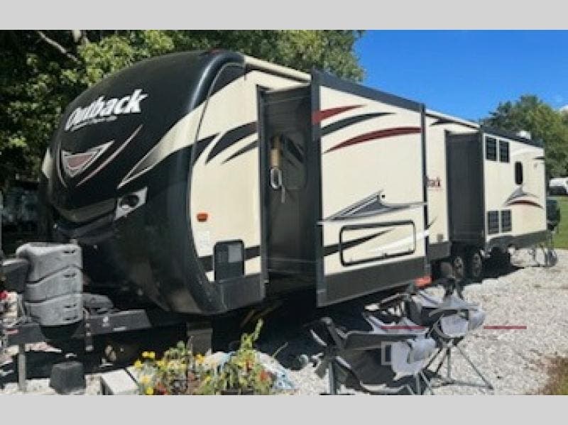 Used 2016  Keystone Outback 328RL by Keystone from RV Dynasty in Bunker Hill, IN