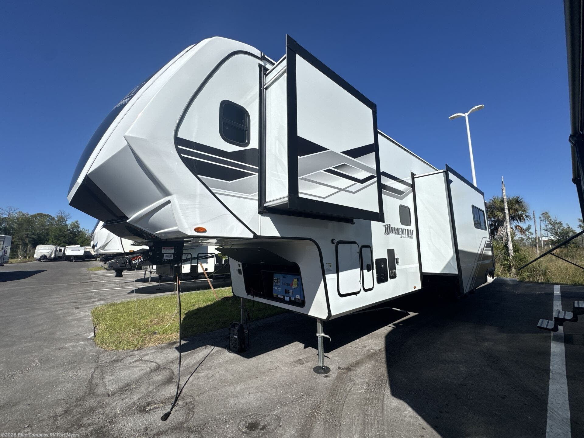 New 2026  Grand Design Momentum G-Class 394G by Grand Design from Blue Compass RV Fort Myers in Fort Myers, FL